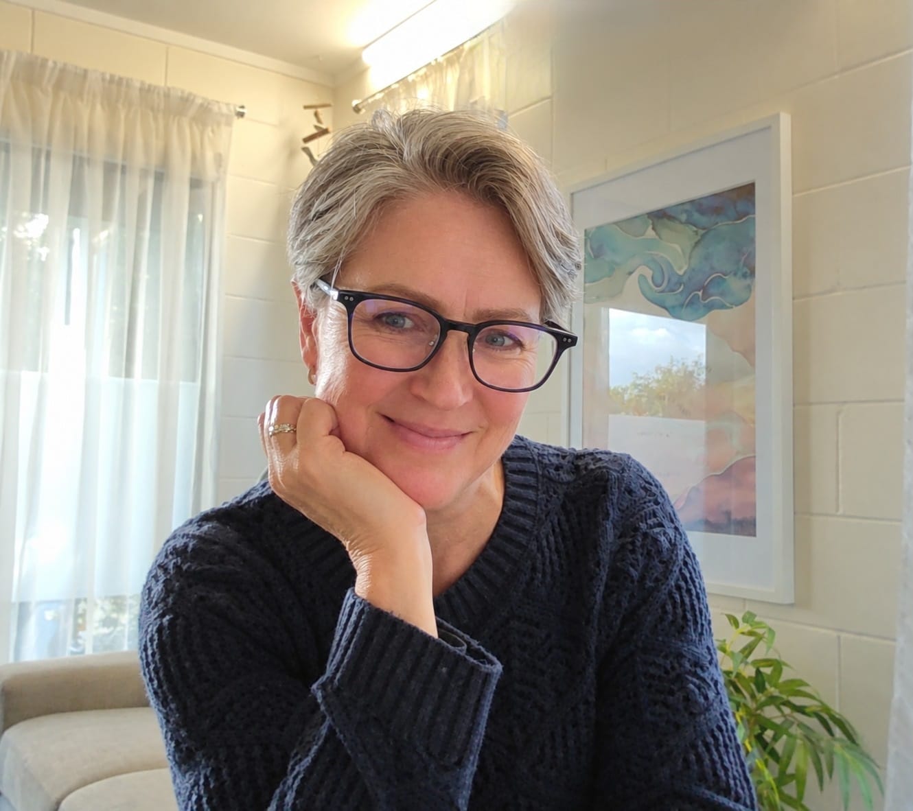 Shirley Parker, Registered Mental Health and Behaviour Therapist, smiling in her therapy room